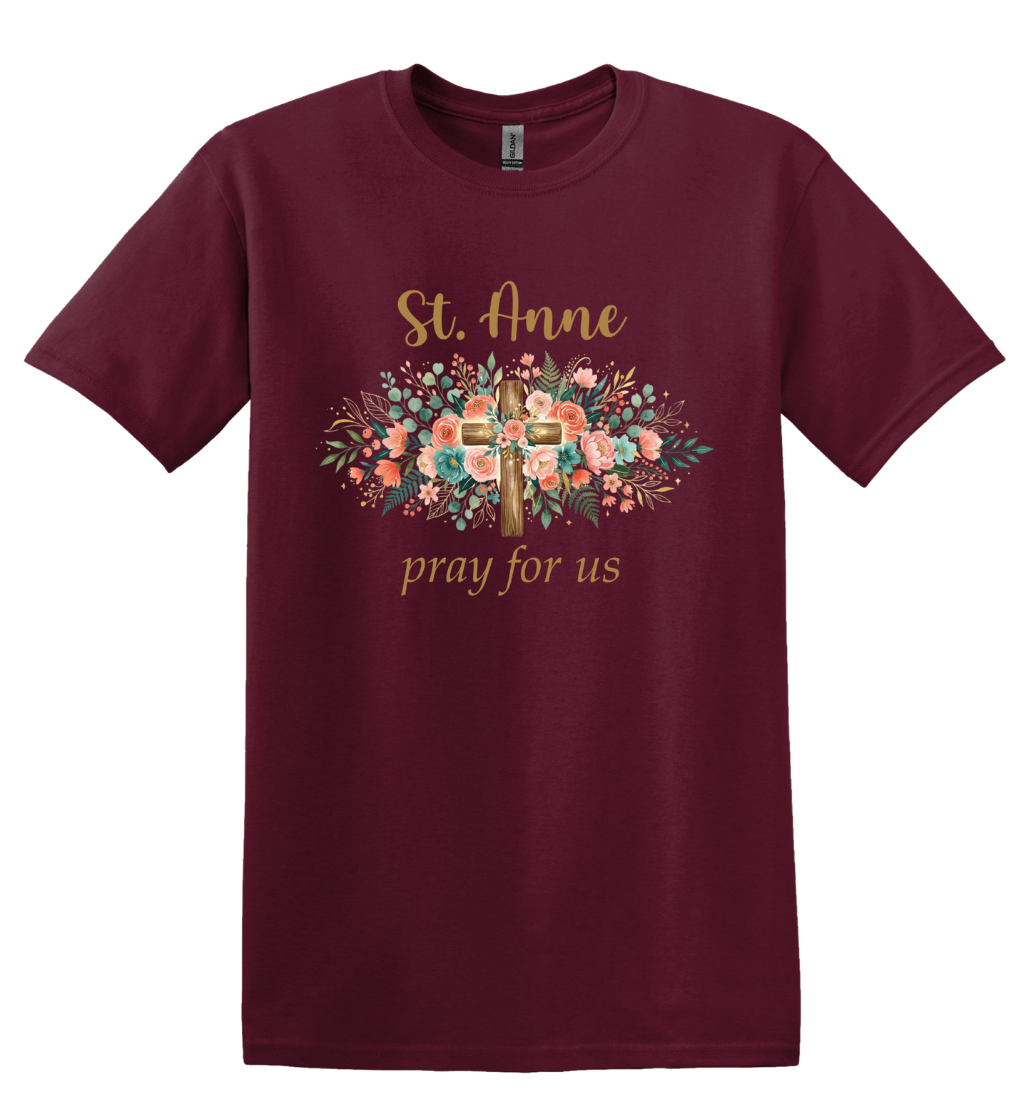 A maroon shirt with a floral cross that says "St. Anne Pray for Us"