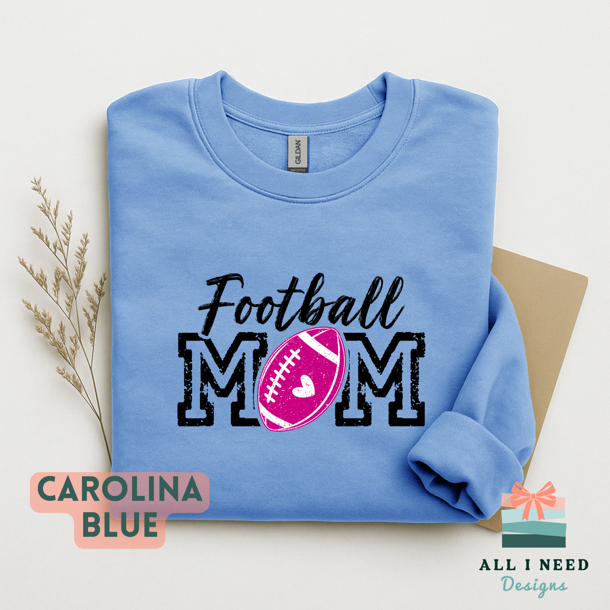 Proud Football Mom Hoodie for Game Day, pink heart design, unisex sizing, sizes XS-3XL
