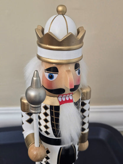 Crowned Harlequin Nutcracker Figure, gold and black, wooden Christmas decor