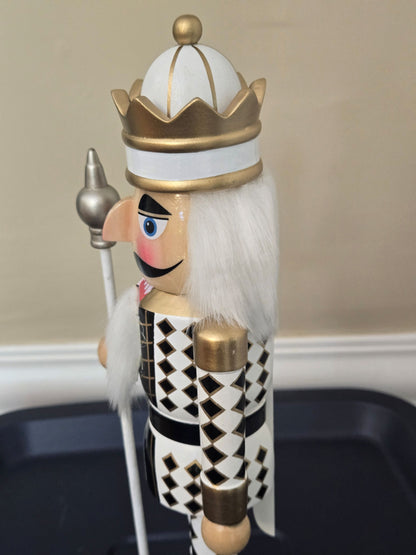 Crowned Harlequin Nutcracker Figure, gold and black, wooden Christmas decor