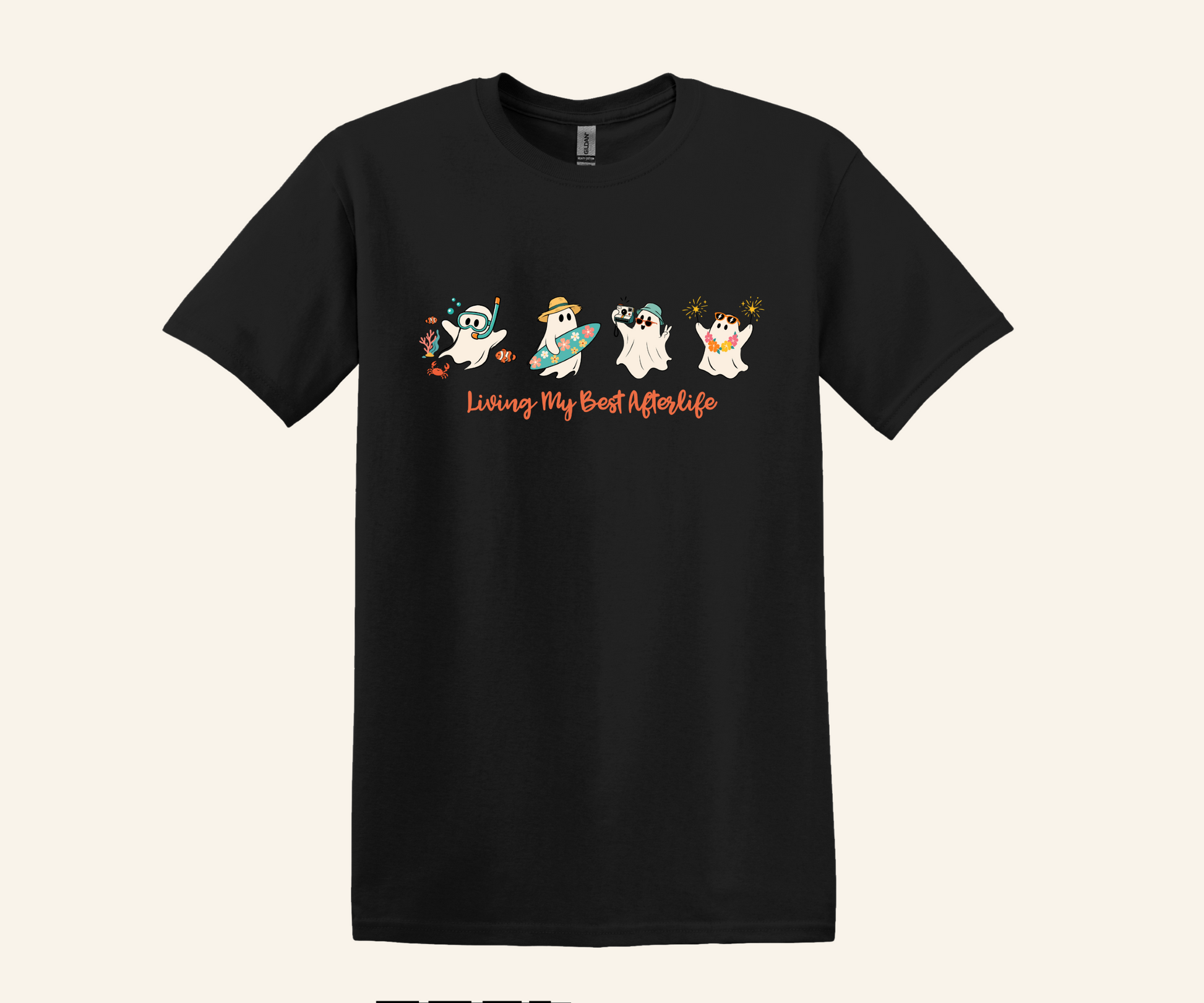 A black short-sleeve crewneck t-shirt featuring a cartoon graphic of four ghosts and the text 'Living My Best Afterlife' in orange, displayed against a solid light beige background.