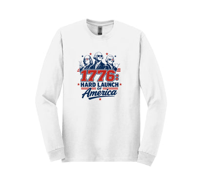 All I Need Designs white long-sleeve tee with "1776: Hard Launch of America" graphic featuring founding fathers in sunglasses.