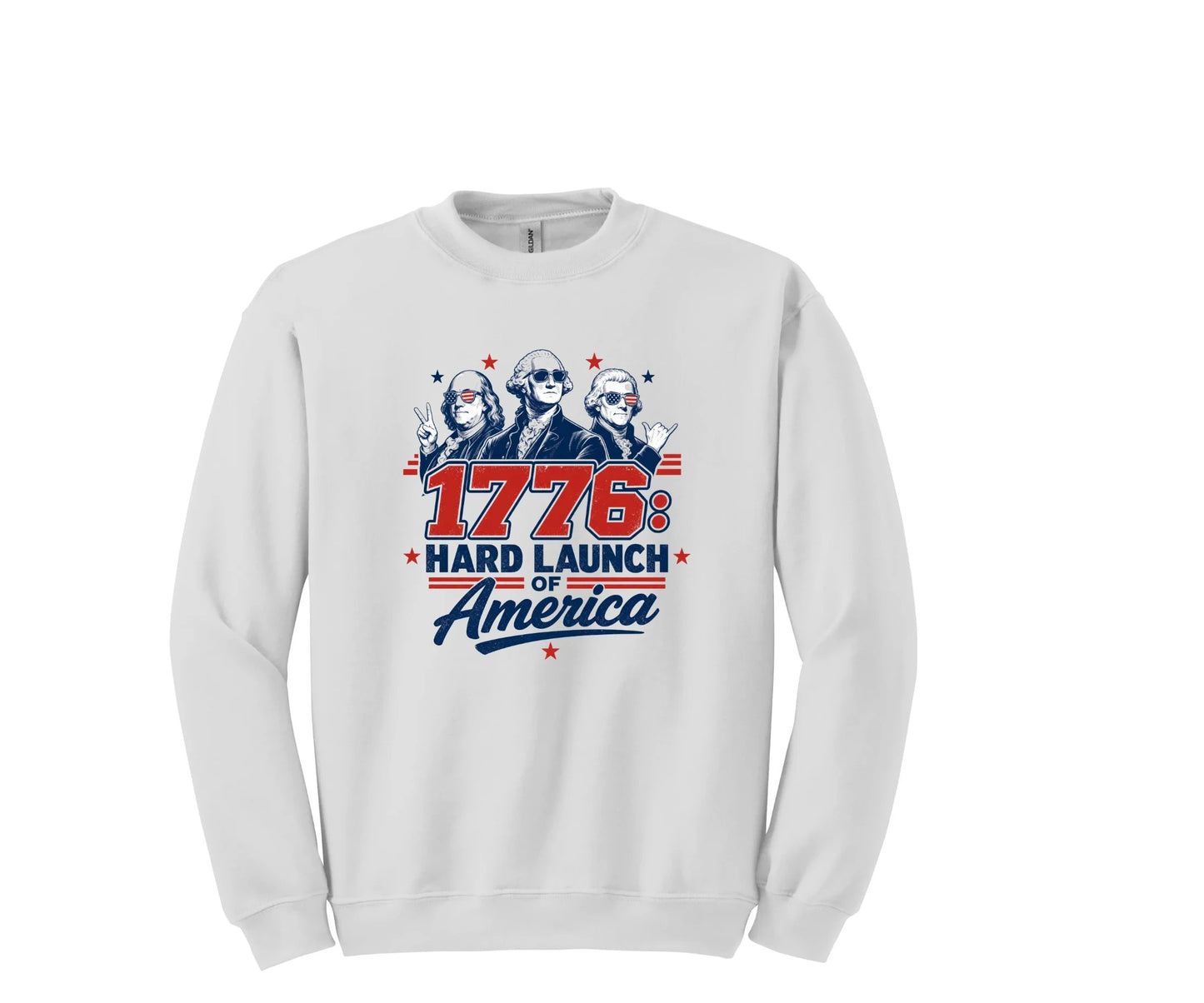 All I Need Designs white crewneck sweatshirt with "1776: Hard Launch of America" graphic featuring founding fathers in sunglasses.