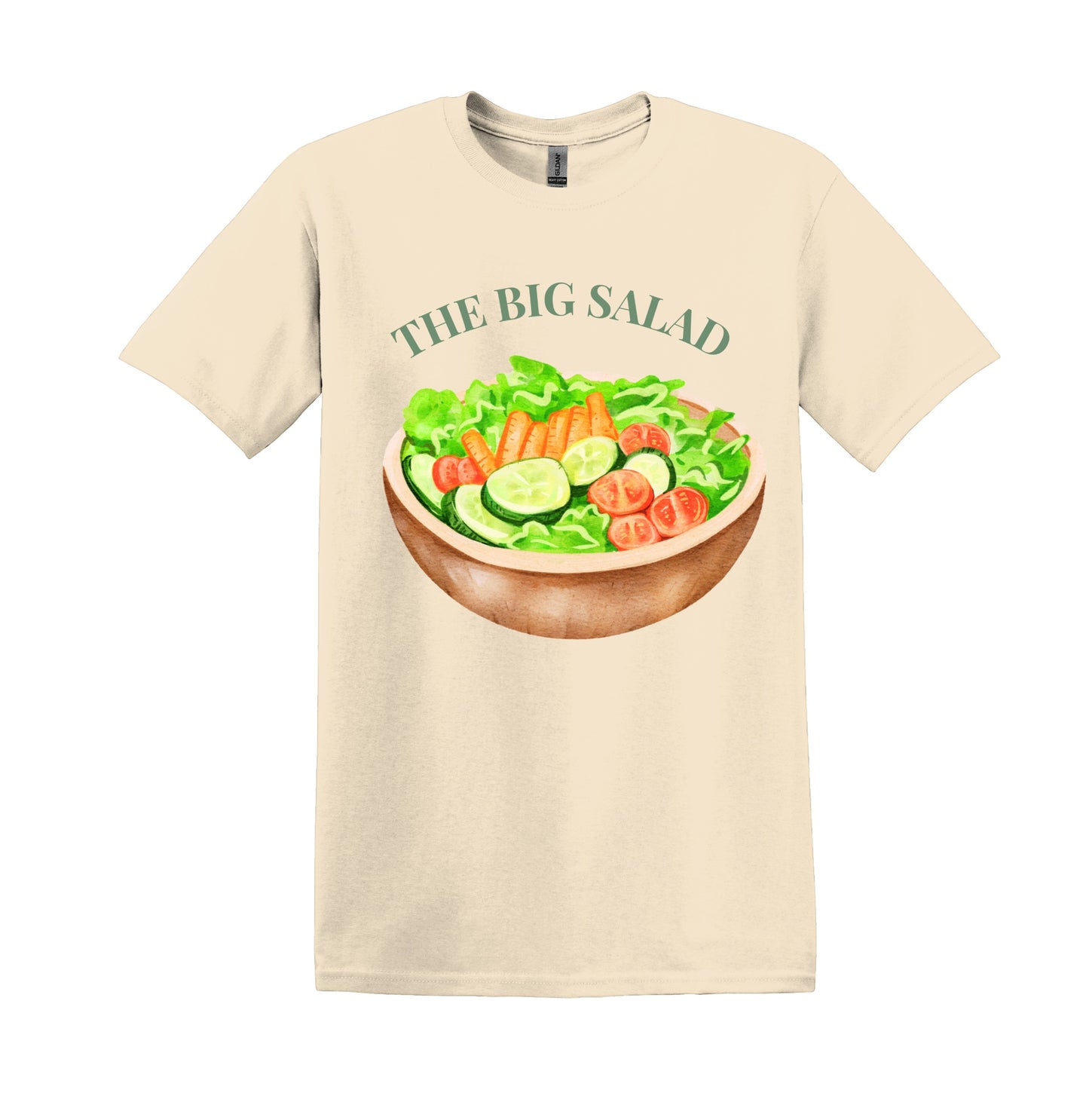 All I Need Designs cream cotton blend unisex tee with a graphic of a wooden bowl filled with lettuce, cucumbers, carrots, and tomatoes, and the text "THE BIG SALAD".