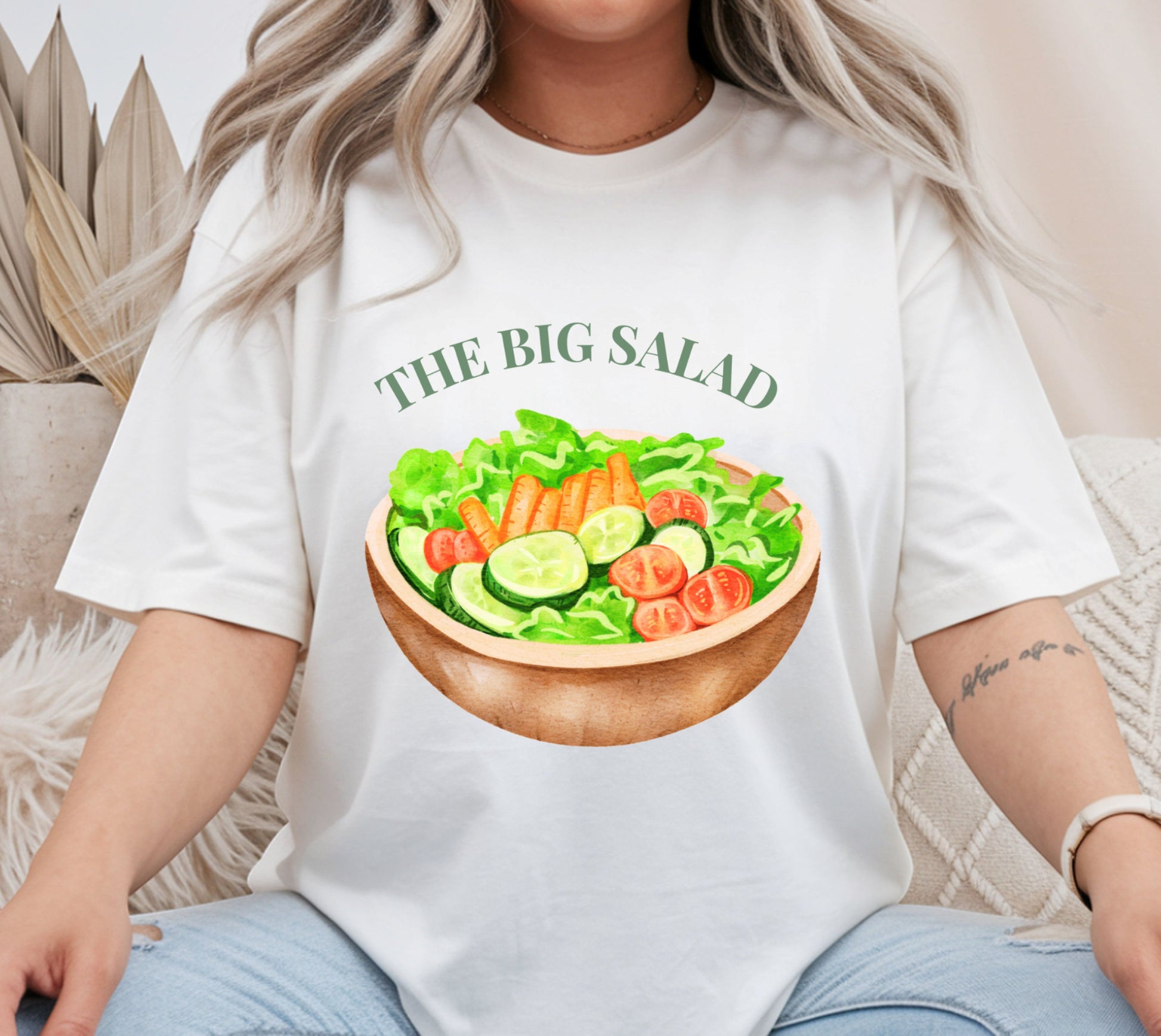 All I Need Designs white cotton blend unisex tee with "The Big Salad" graphic and a watercolor bowl of lettuce, carrots, cucumbers, and tomatoes.
