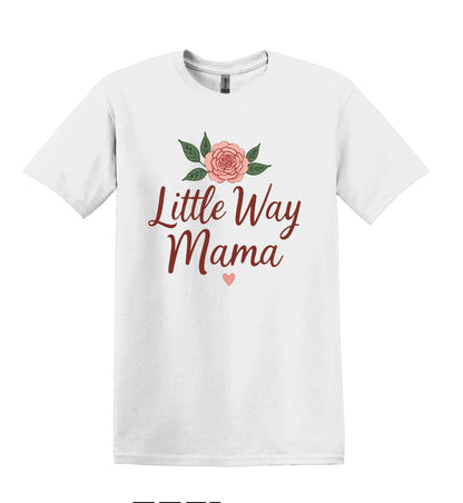 All I Need Designs white cotton-blend unisex t-shirt with "Little Way Mama" text and a rose graphic.