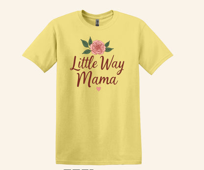 All I Need Designs yellow cotton-blend unisex t-shirt with pink rose graphic and "Little Way Mama" text.