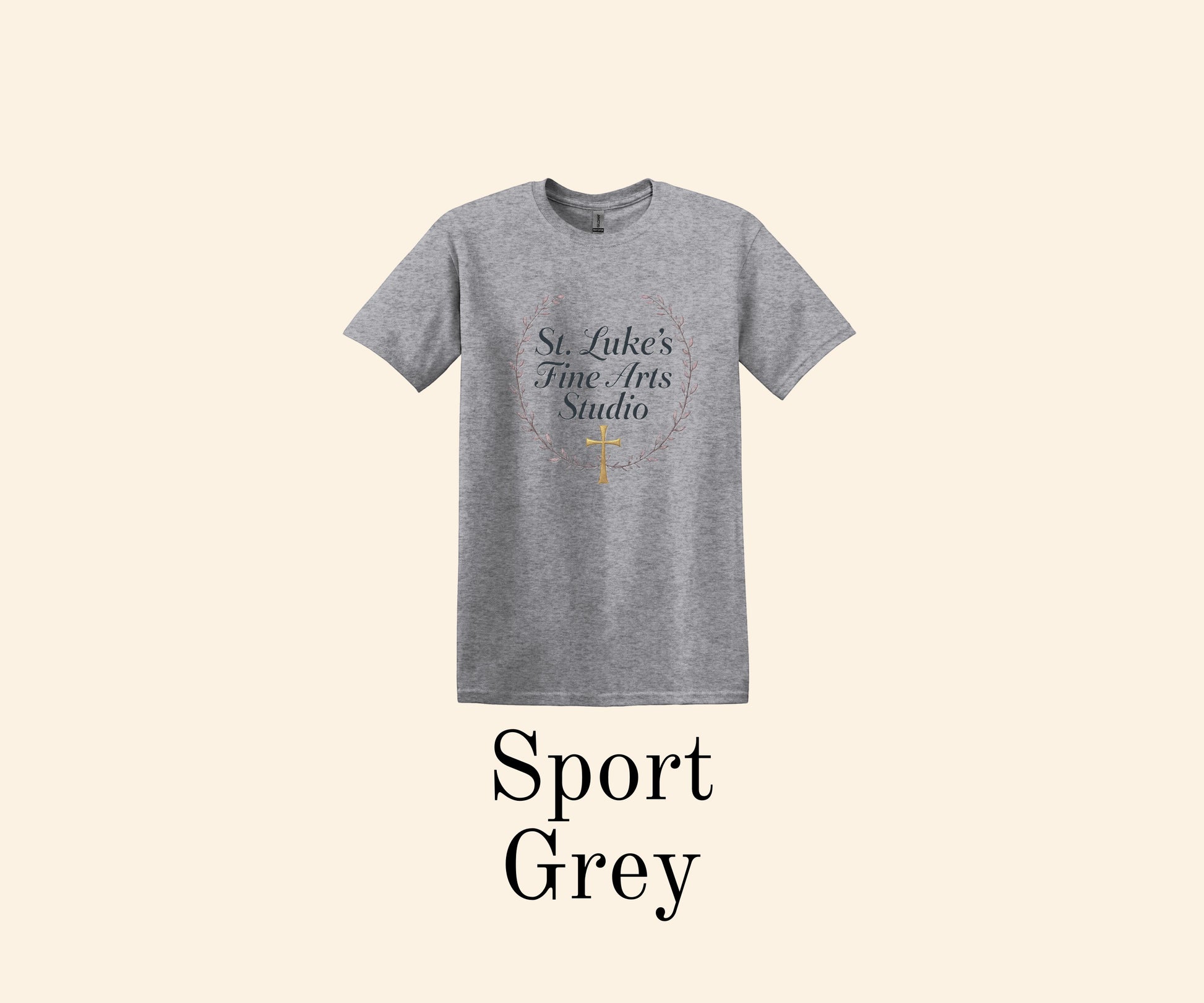 All I Need Designs Sport Grey t-shirt with St. Luke's Fine Arts Studio text and gold cross within a laurel wreath.